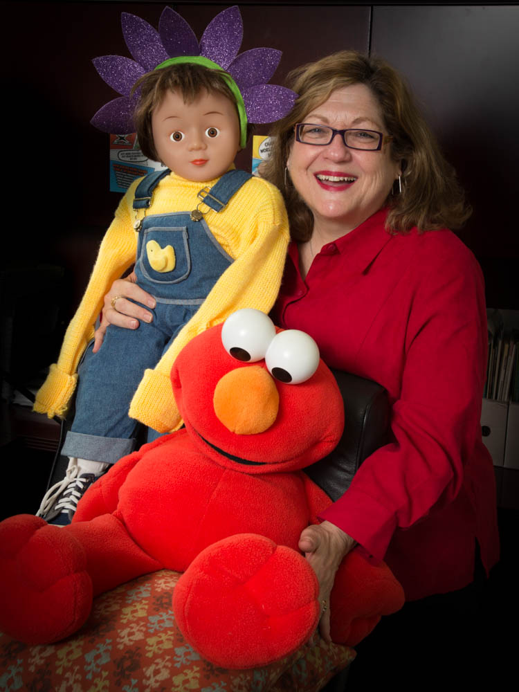Fredlyn Berger with therapy dolls used in early intervention sessions